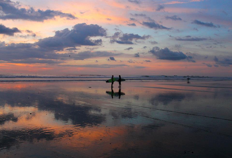 Surfers Meeting on Beach